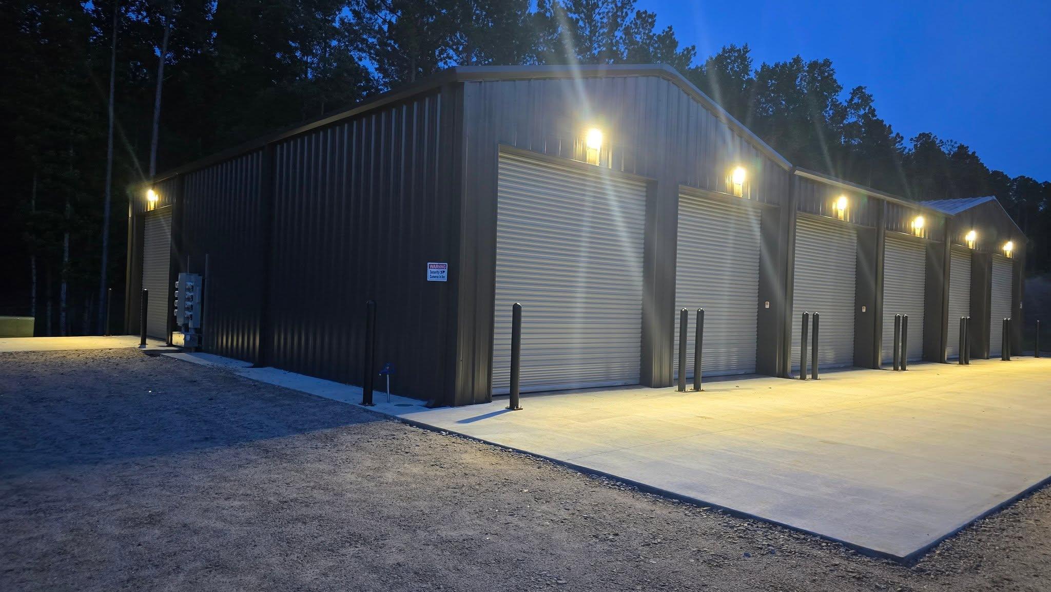 Outdoor security and entry lighting installed on a home exterior in the Auburn–Opelika area